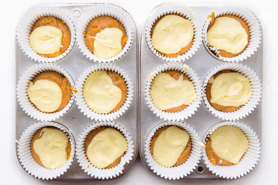 Broma Bakery | The Ultimate Pumpkin Muffins: luscious pumpkin muffins with a cheesecake center and almond streusel topping!