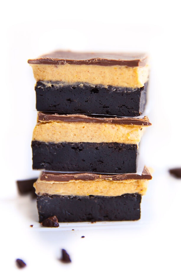 Fudgy brownies topped with a pumpkin cream cheese frosting and bittersweet chocolate. Betcha can't eat just one | via Broma Bakery | #brownies #pumpkin #creamcheese