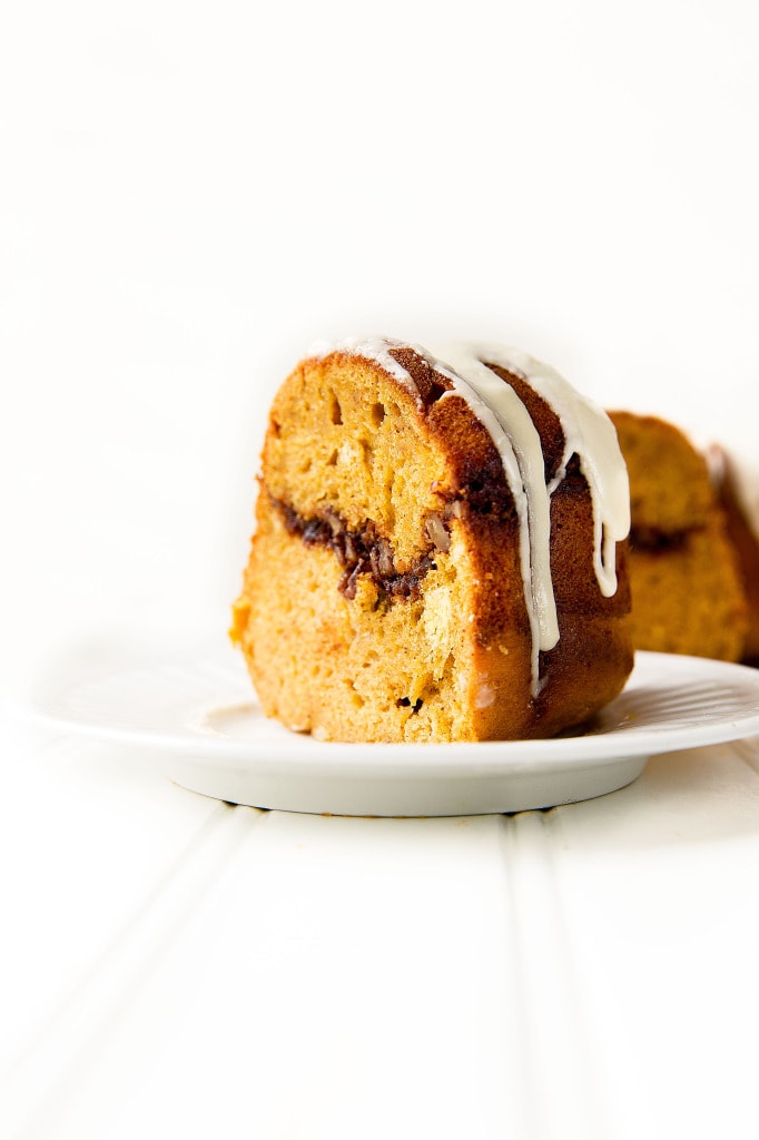 A spiced sweet potato bundt cake with pecan streusel and topped with a maple syrup glaze | via Broma Bakery | #sweetpotato #bundtcake
