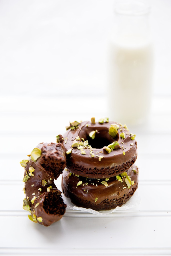 Baked Double Chocolate Donuts with a chocolate glaze and crushed pistachios | Broma Bakery