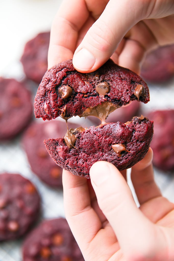 red velvet cookie being pulled apart