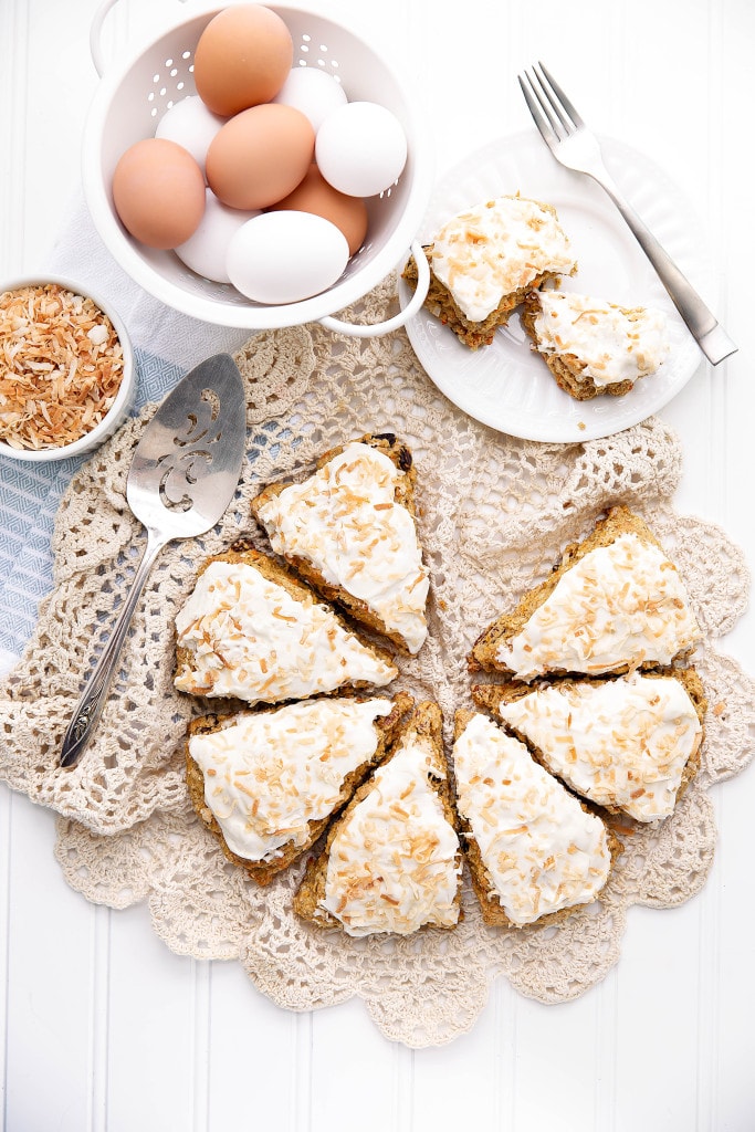Moist and delicious Carrot Cake Scones topped with a sinful coconut cream cheese frosting are a perfect weekend breakfast!