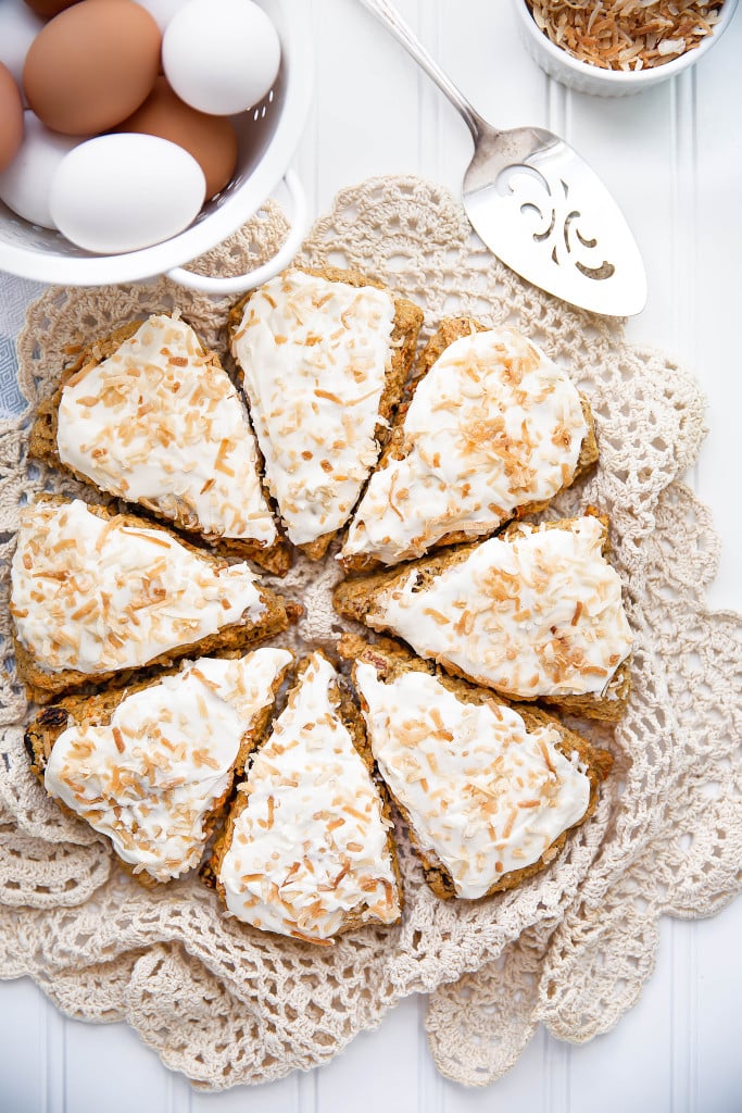 Moist and delicious Carrot Cake Scones topped with a sinful coconut cream cheese frosting are a perfect weekend breakfast!