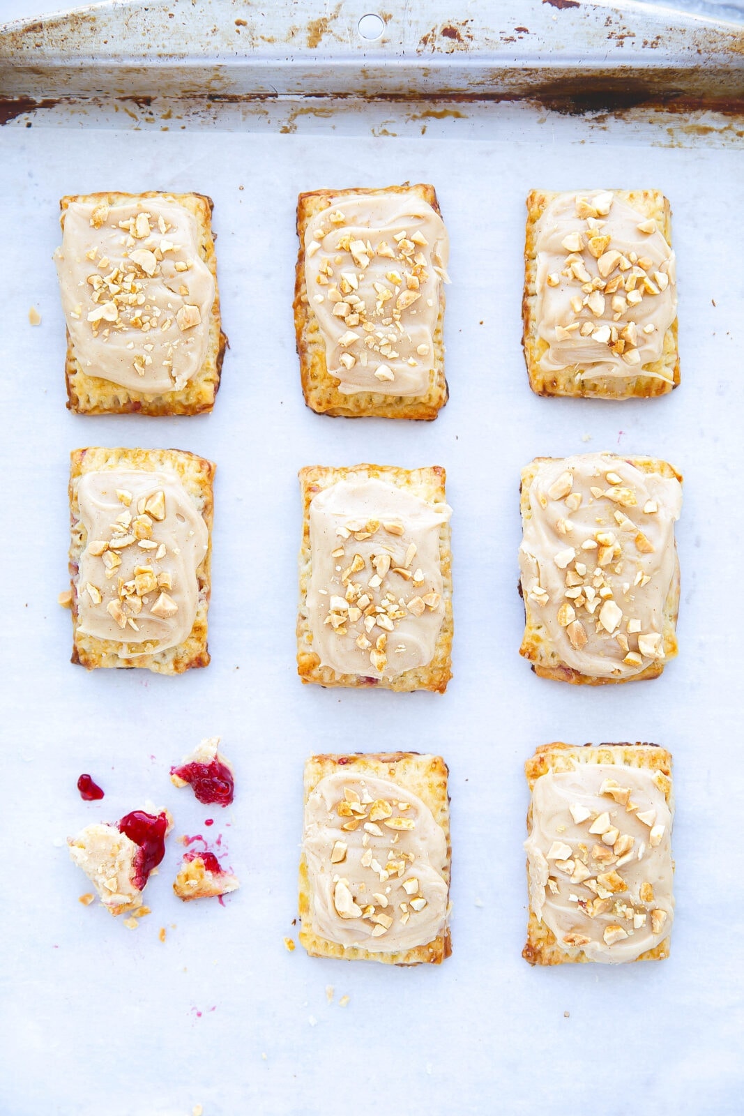 In honor of National Pi Day, these Mini Peanut Butter Jelly Pop Tarts combine flakey pastry strudel, a jelly center, and peanut butter icing in this bite sized treat that everyone will love!