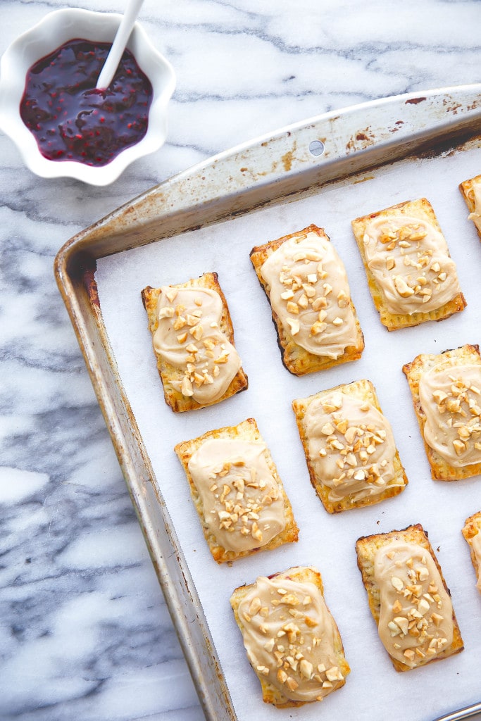 In honor of National Pi Day, these Mini Peanut Butter Jelly Pop Tarts combine flakey pastry strudel, a jelly center, and peanut butter icing in this bite sized treat that everyone will love!