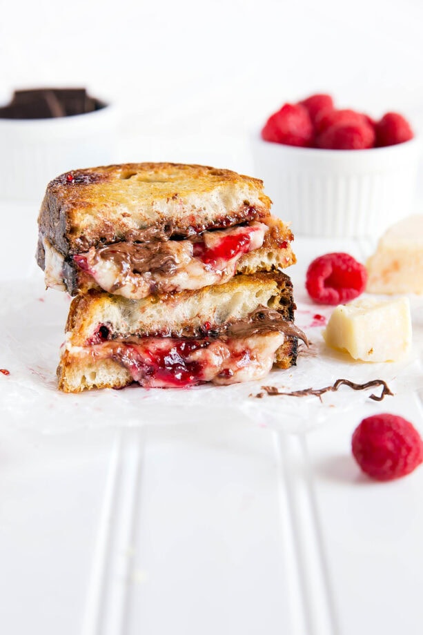 Nutty Havarti cheese is paired with Nutella and raspberry jam to make the tastiest grilled cheese I've ever had!