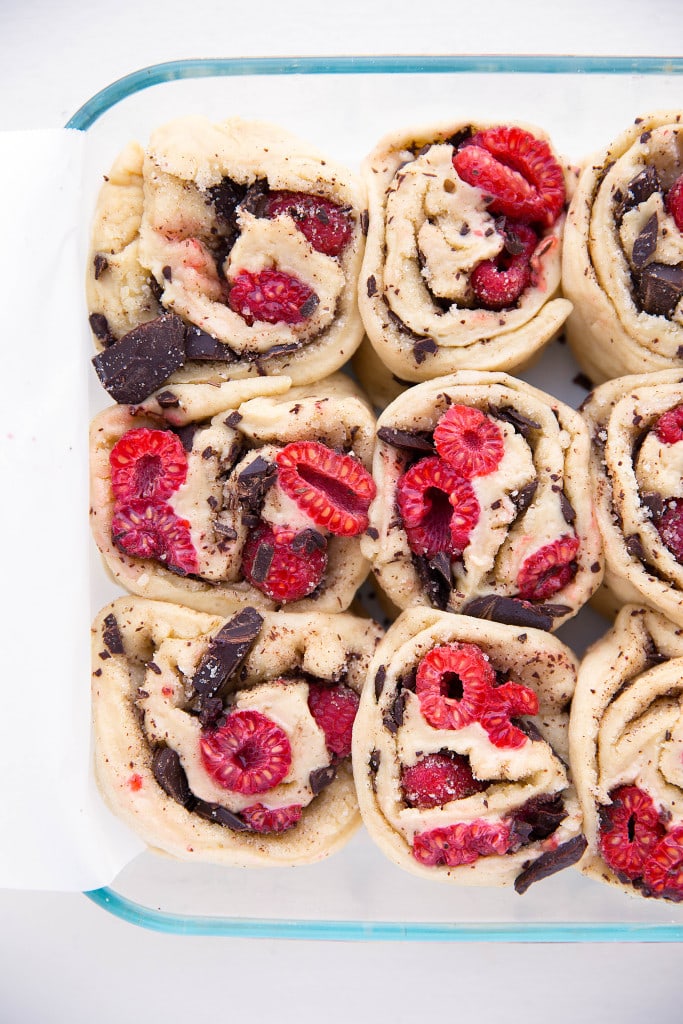 Pieces of dark chocolate and plump raspberries are tucked inside the most light and chewy dough in these Dark Chocolate Raspberry Sticky Buns. Quite possibly the best buns I've ever had!