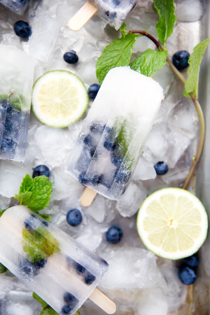 Get your booze on with these thirst-quenching Blueberry Mojito Popsicles!