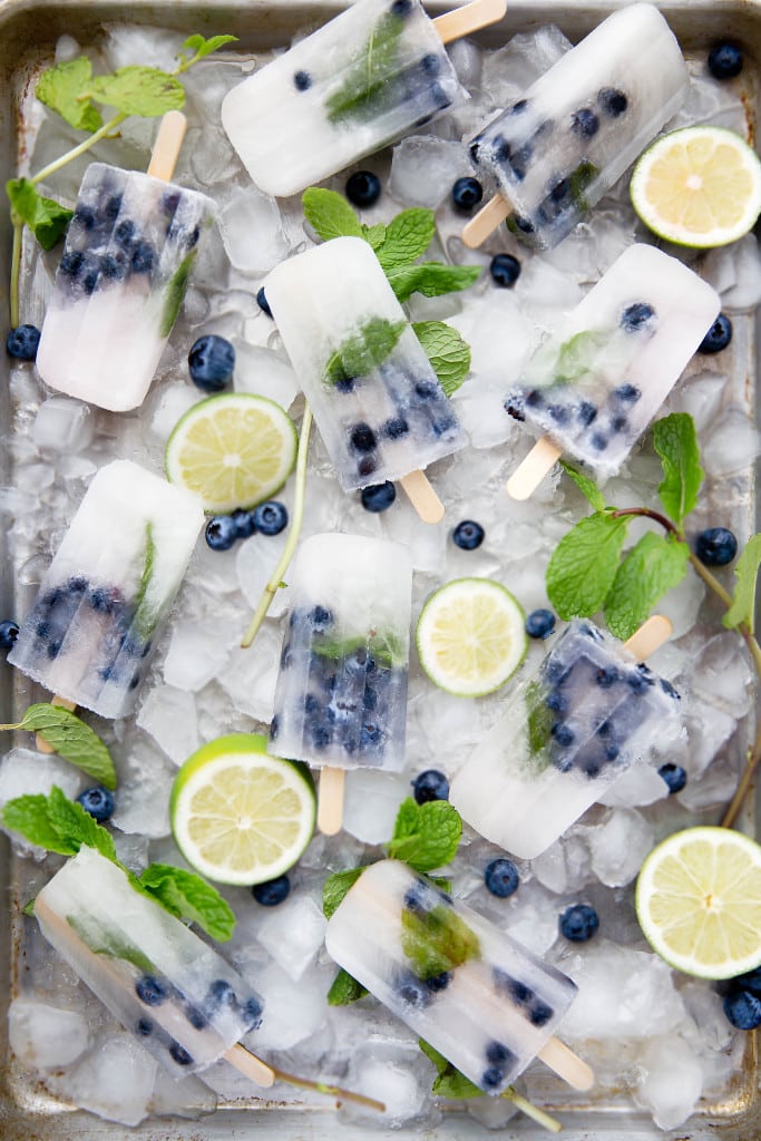 Get your booze on with these thirst-quenching Blueberry Mojito Popsicles!