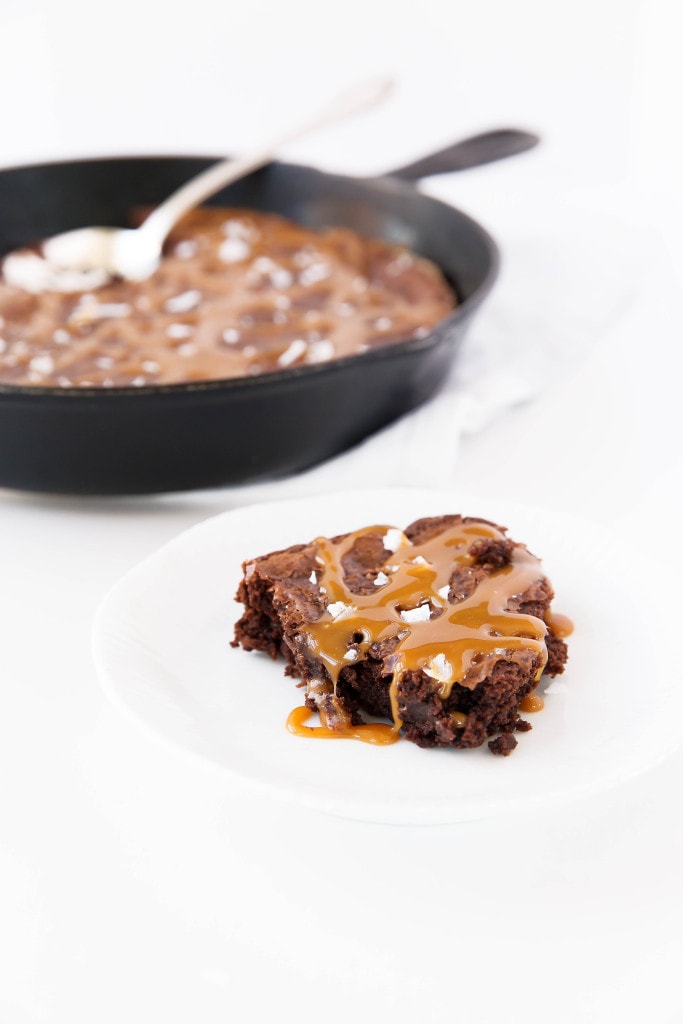 Salted Caramel Skillet Brownie: the fudgiest brownie laden with homemade salted caramel and baked in a caste iron pan!
