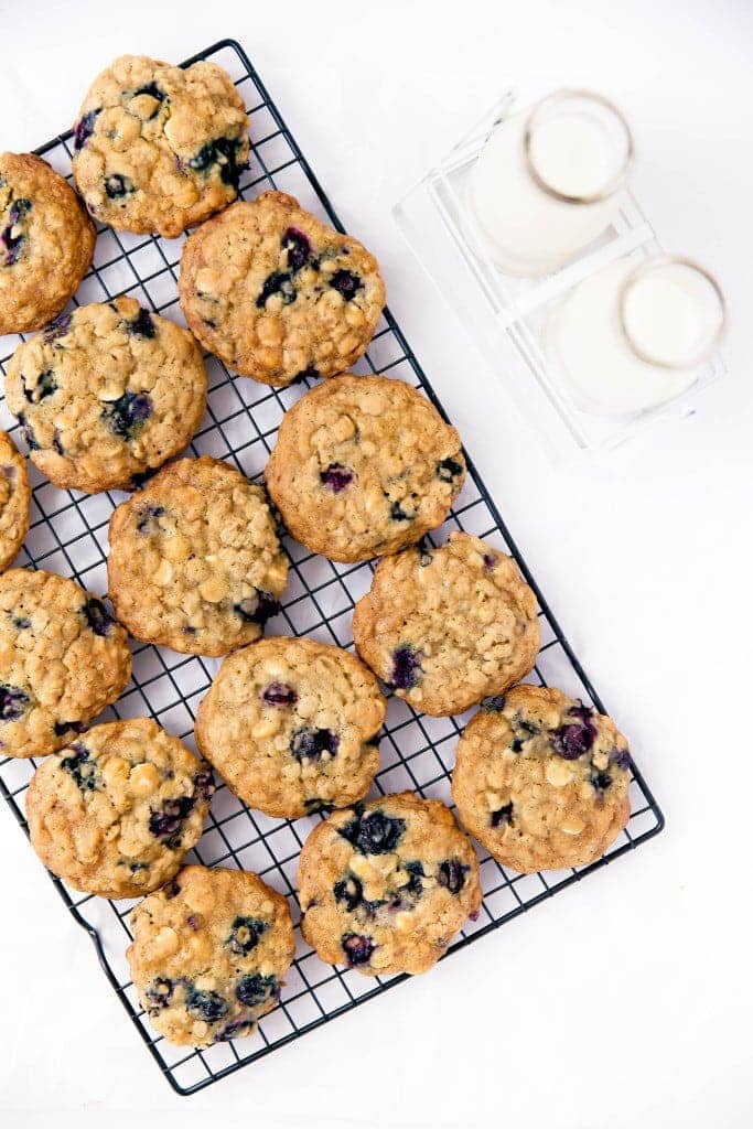 white chocolate blueberry oatmeal cookies on wire rack