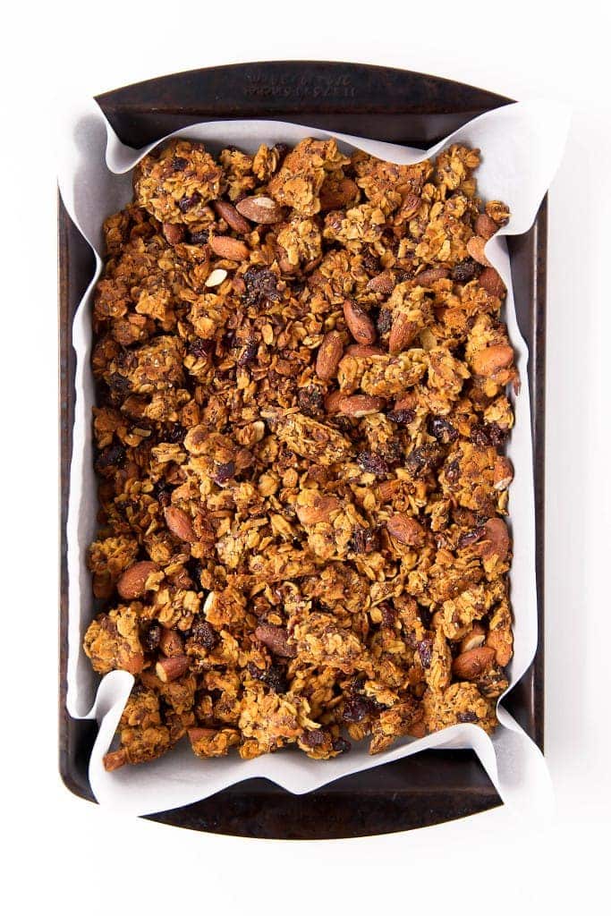 Packed with carrots, coconut, cinnamon, and raisins, this Carrot Cake Granola takes breakfast up a notch. Gluten free, refined sugar free, and loaded with ingredients that will keep you full all morning long.