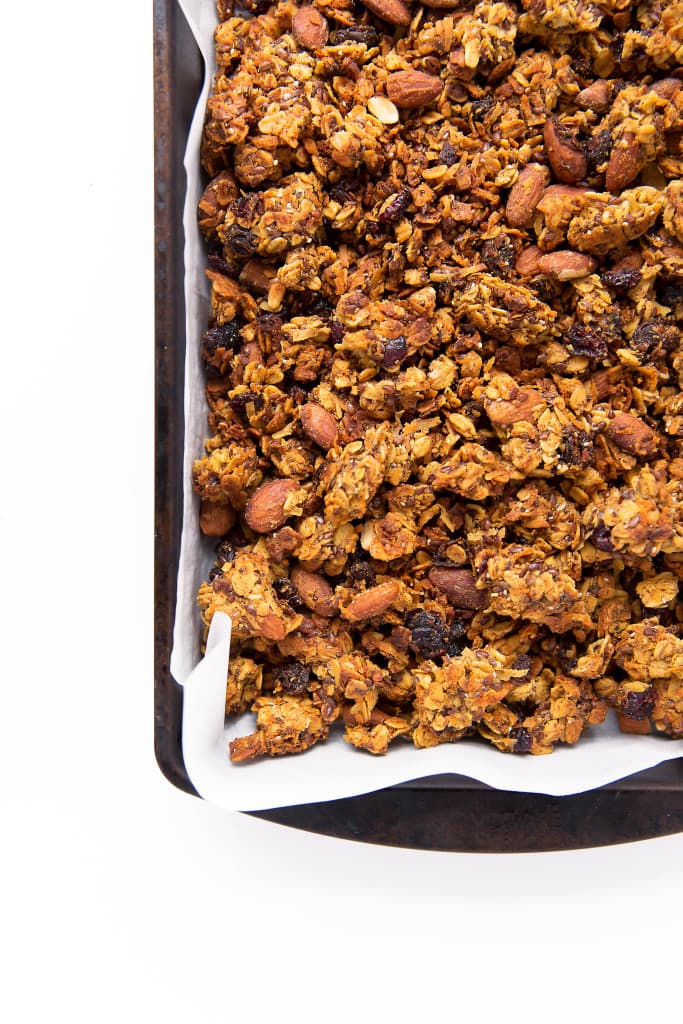 Packed with carrots, coconut, cinnamon, and raisins, this Carrot Cake Granola takes breakfast up a notch. Gluten free, refined sugar free, and loaded with ingredients that will keep you full all morning long.