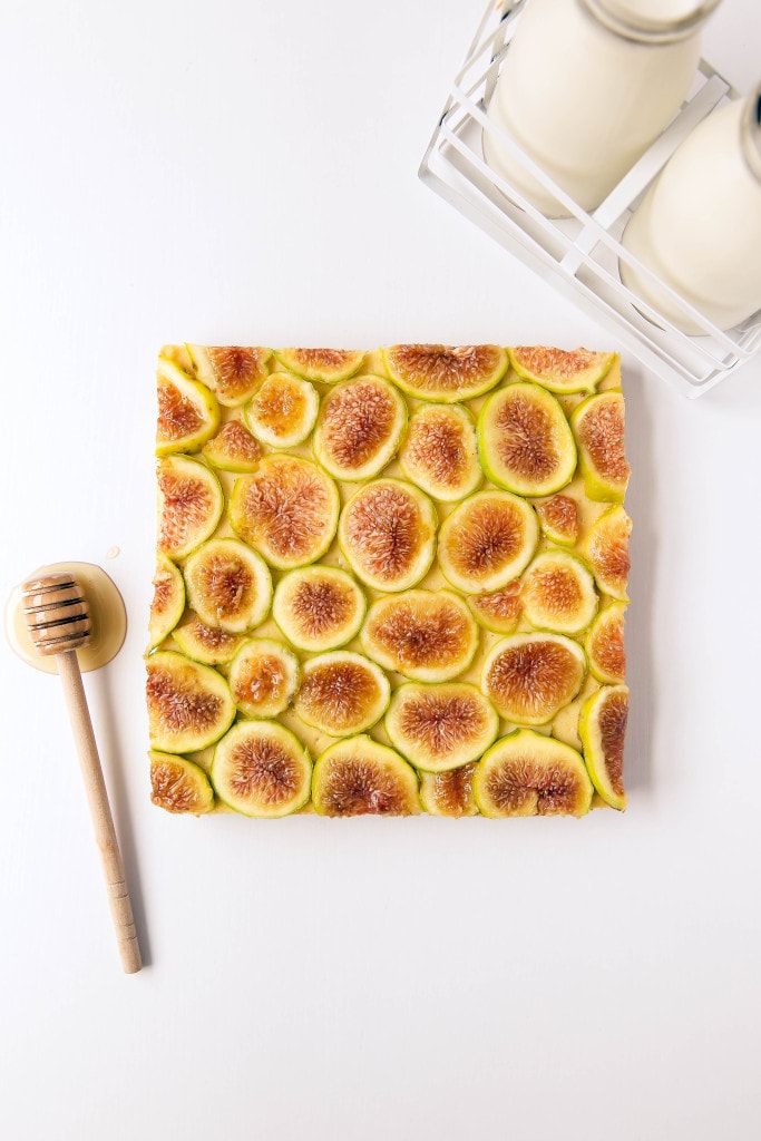 Honey Walnut Fig Cheesecake Bars: velvety honey cheesecake with a graham cracker walnut crust and a mosaic of fresh figs.