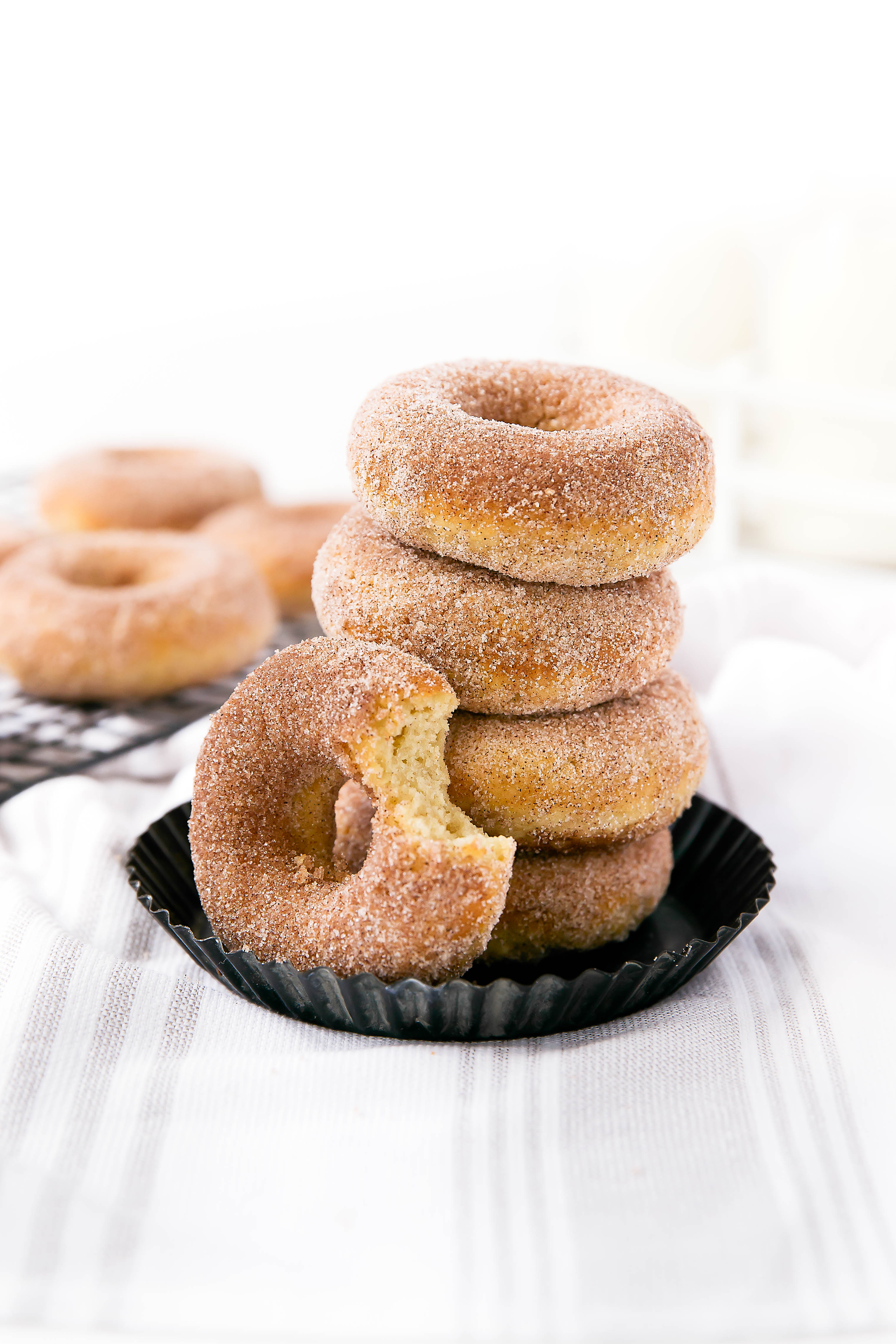 The softest and most addicting Snickerdoodle Donuts. Oh yeah, and they're baked!