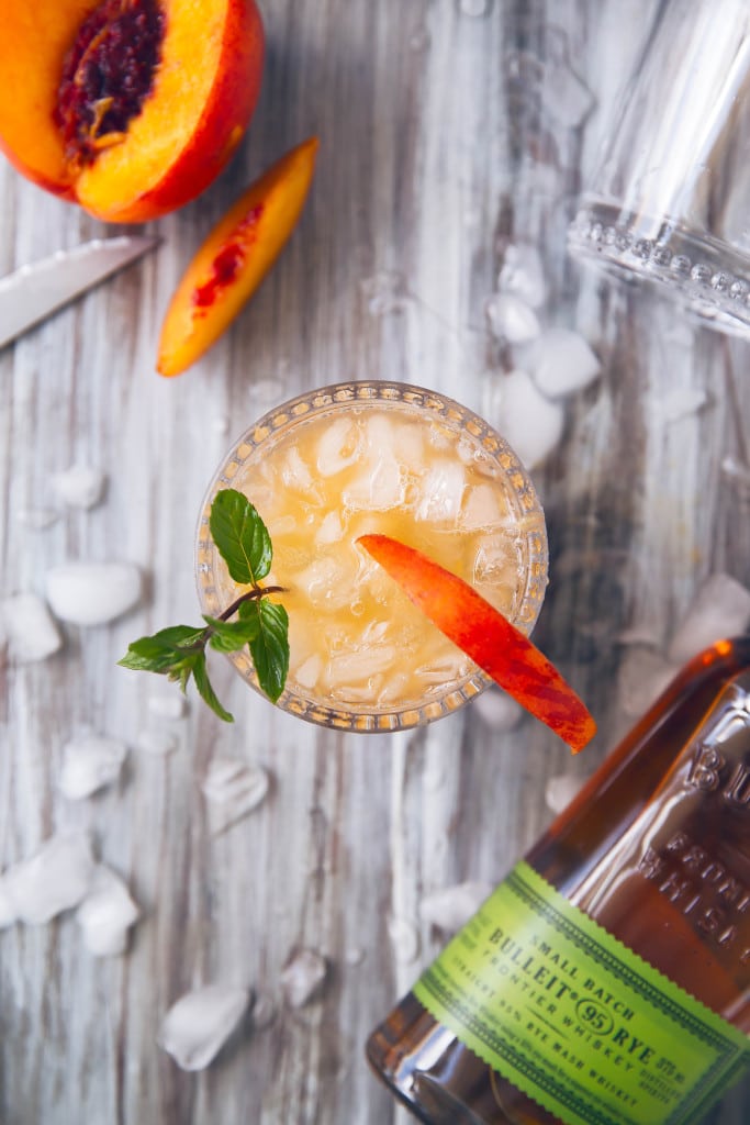 The classic mint julep gets a twist with this mouth-watering Peach Julep!