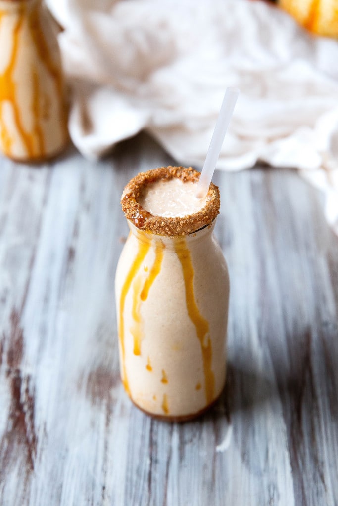 Boozy pumpkin milkshake in a rimmed glass