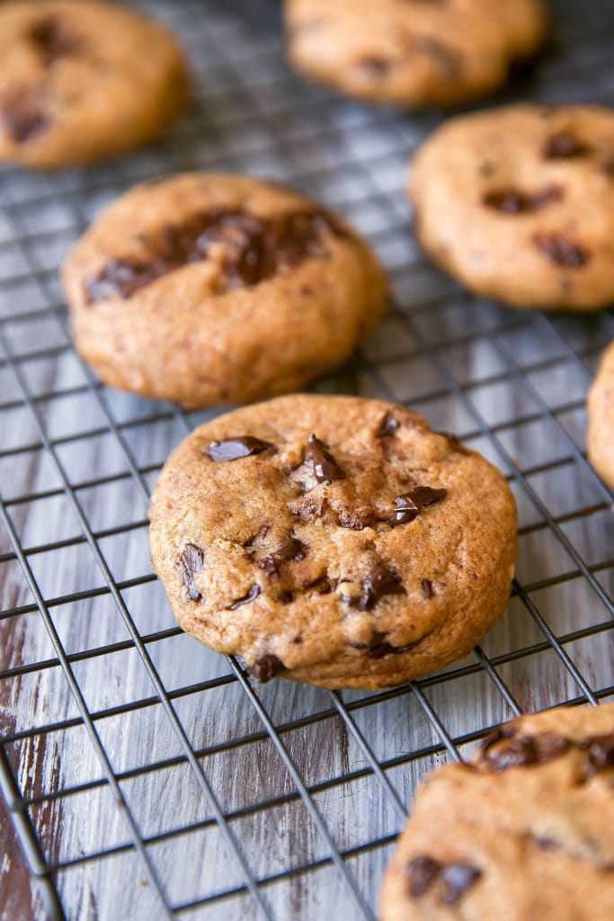 pumpkin chocolate chip cookies on a wire rack