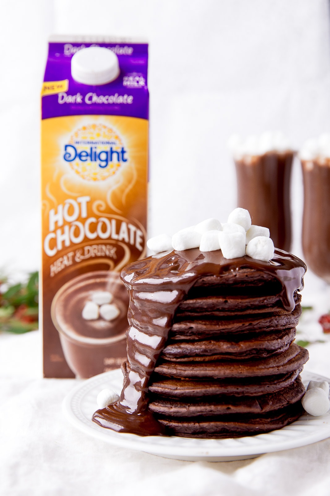 Hot Chocolate Pancakes with fudge sauce