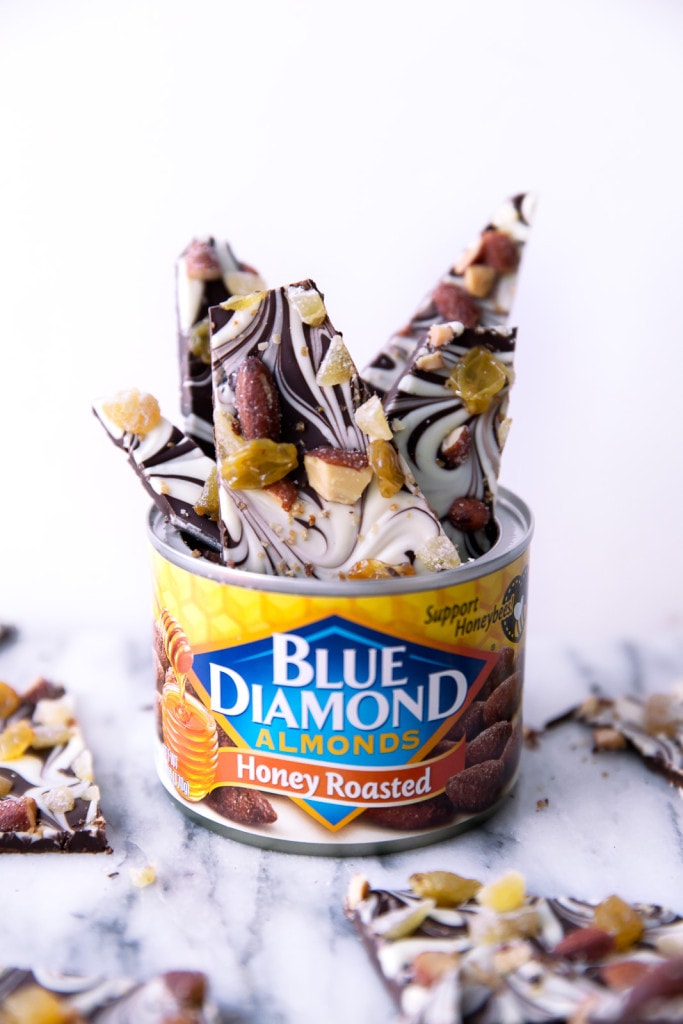 A festive dark and white chocolate bark with golden accents perfect for New Year's Eve!