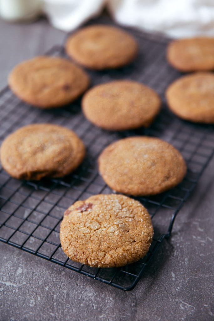 gingersnap cookies on a cooling rack