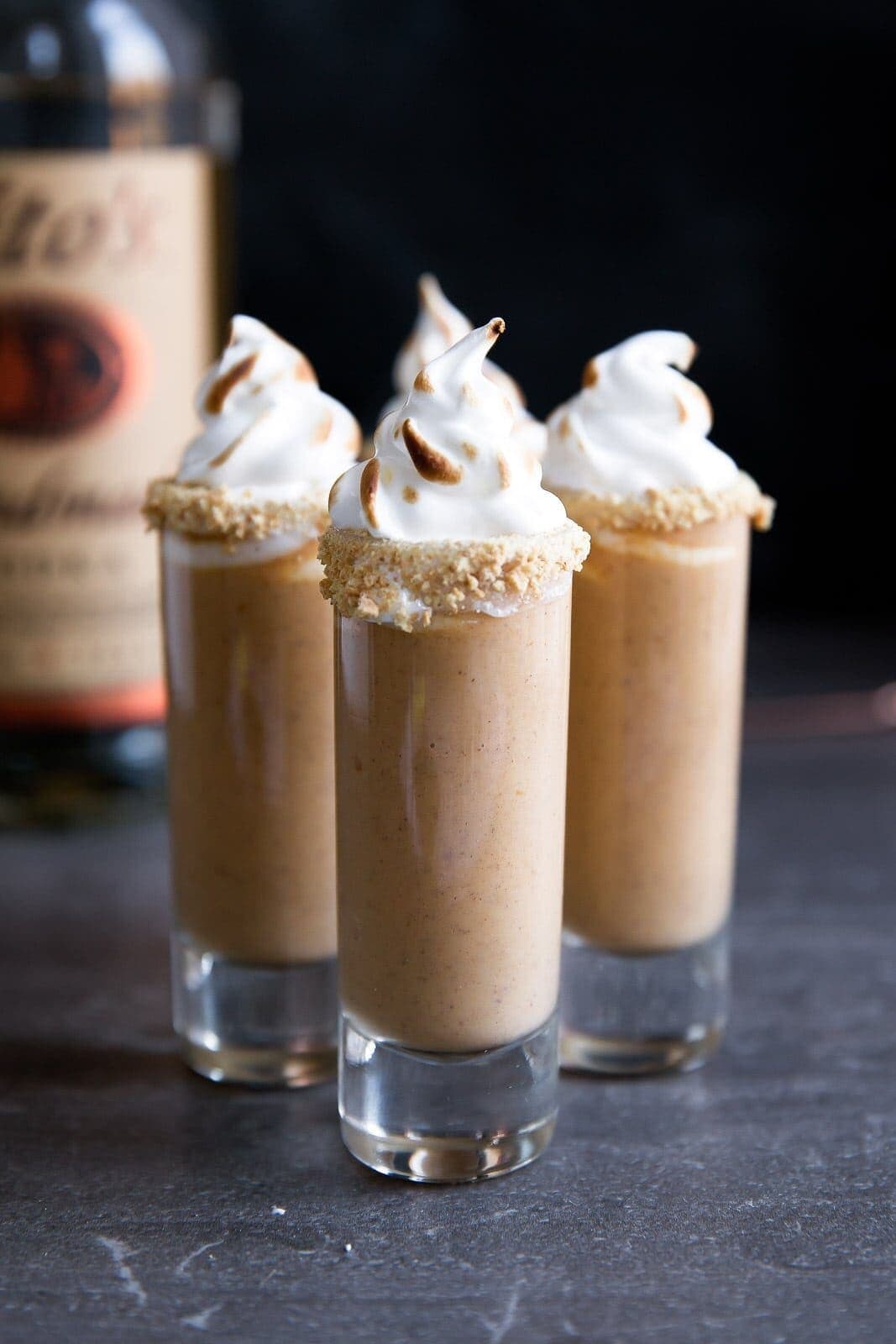 Pumpkin pie gets a delicious twist in these Boozy Pumpkin Pie Shooters!