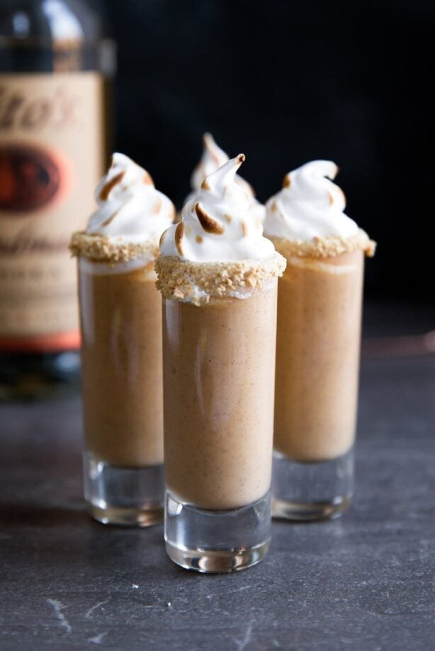 Pumpkin pie gets a delicious twist in these Boozy Pumpkin Pie Shooters!