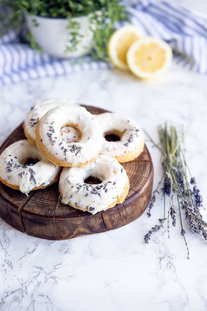 Celebrate spring with baked lemon donuts dipped in a lavender-infused white chocolate ganache!