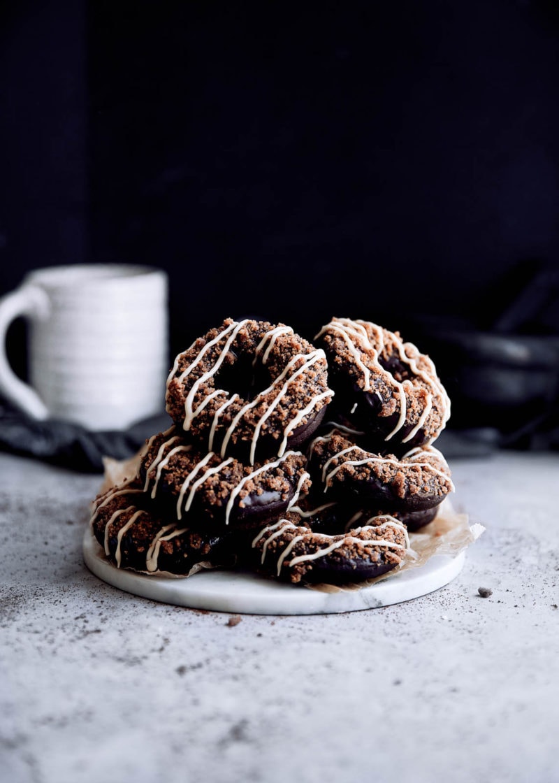 Mocha donuts with chocolate ganache, mocha toffee crunch, and coffee glaze. These babies are just begging to be dipped in your morning coffee.