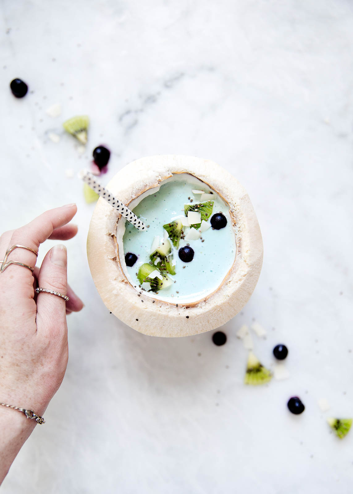 A blue algae smoothie filled with detoxifying spirulina, chia seeds, and blueberries. Hello, summer bod.