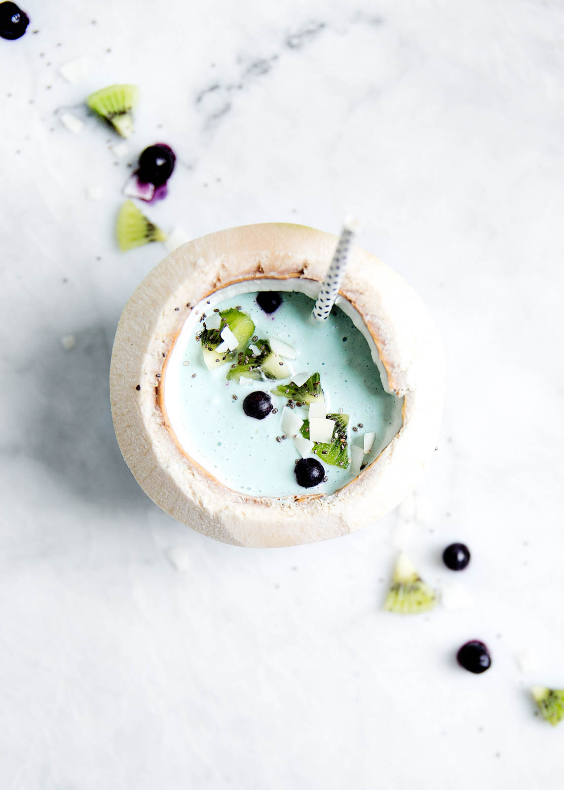 A blue algae smoothie filled with detoxifying spirulina, chia seeds, and blueberries. Hello, summer bod.