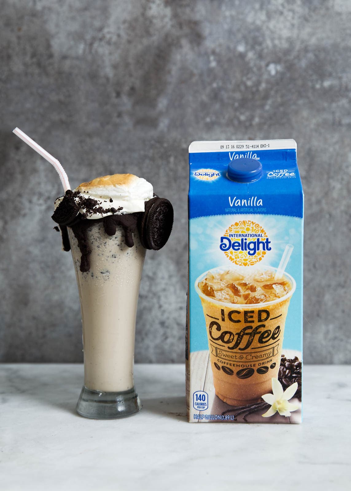 Iced Coffee Cookies and Cream Milkshake with carton of coffee