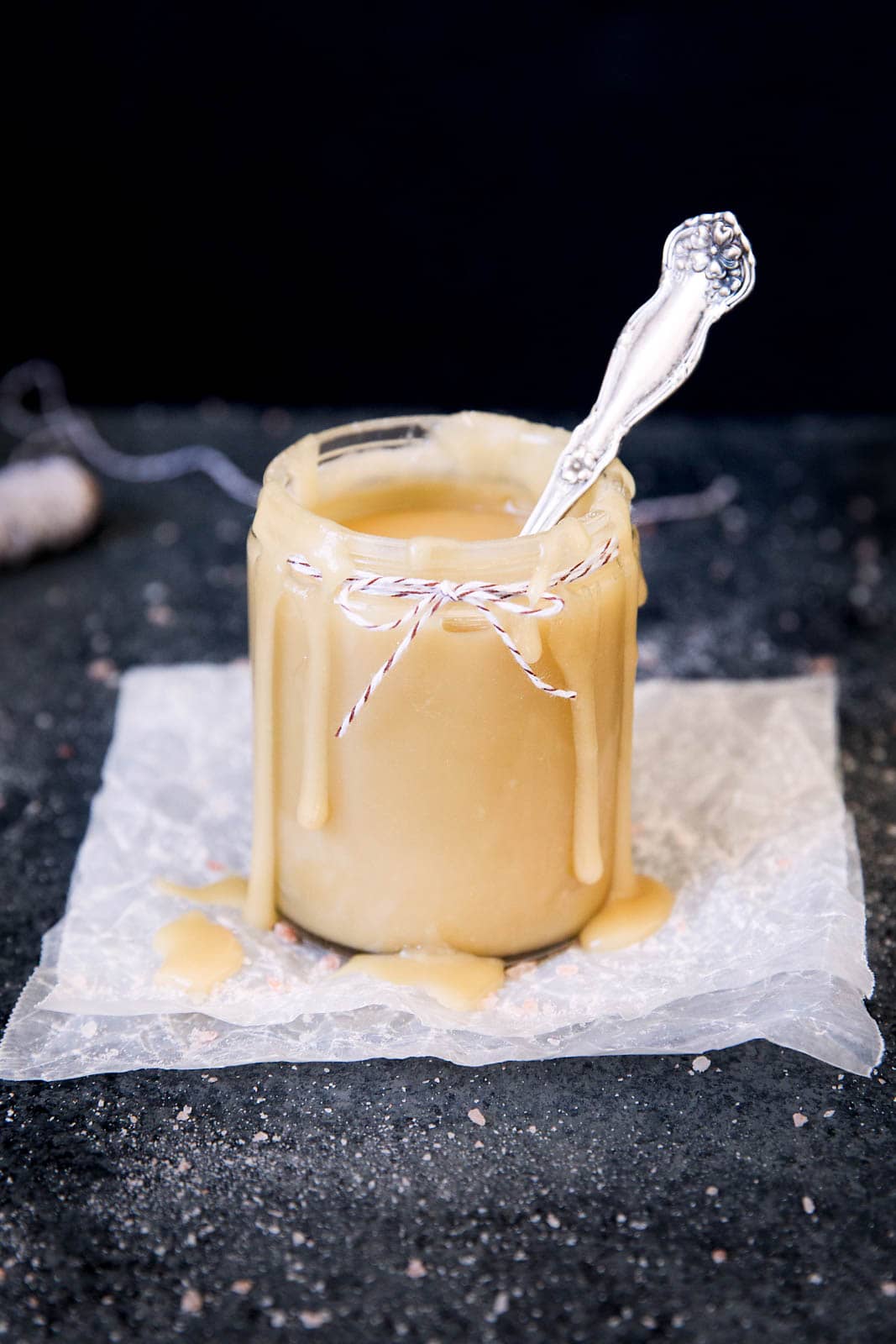 maple salted caramel sauce in a jar with spoon