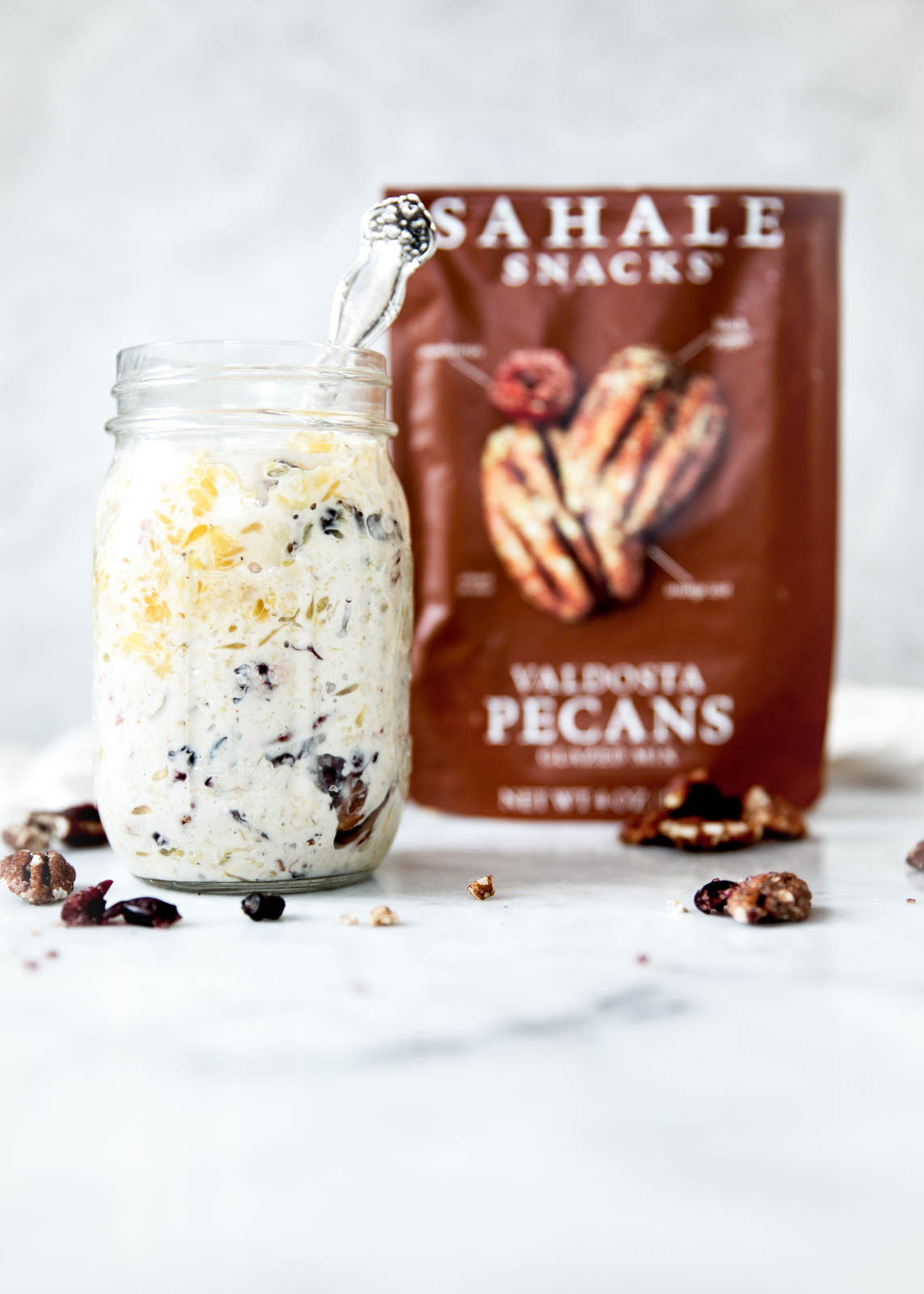 Overnight oats are a simple and nutritious breakfast all year round. This version, with dried cranberries, orange, and Valdosta pecans, is insanely delicious!