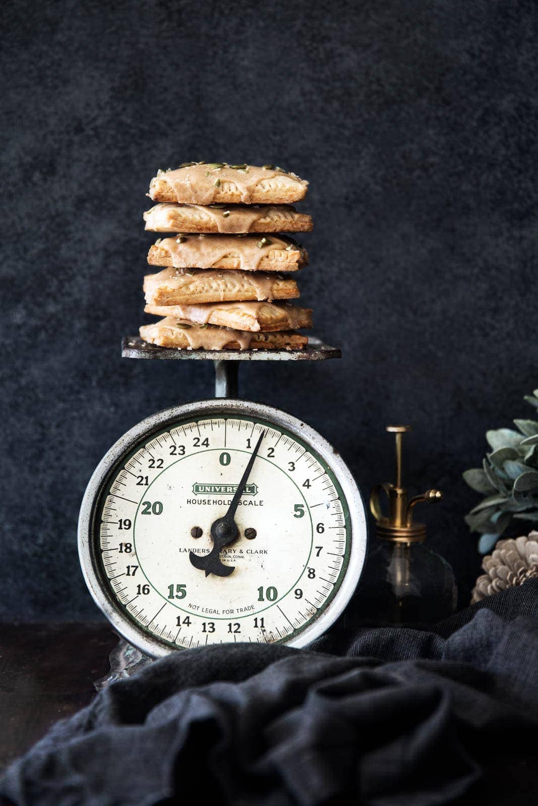 Fresh and flakey homemade Pumpkin Butter Pop Tarts with a cinnamon icing and pepitas. Woah.