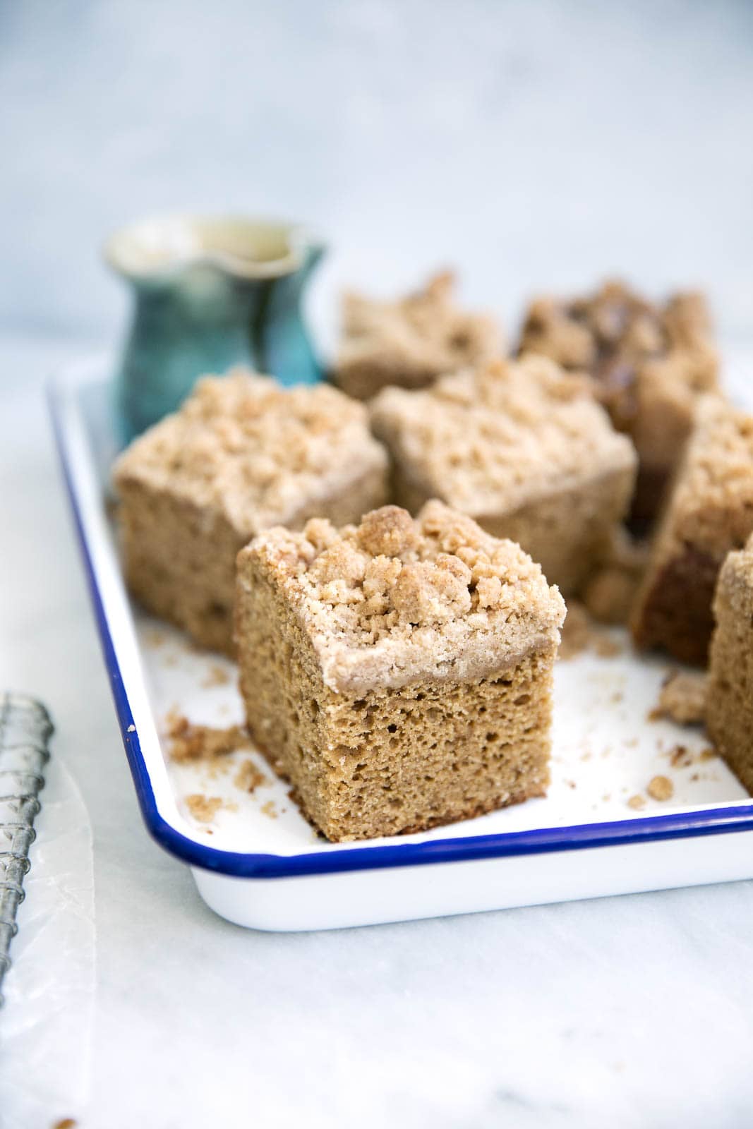 Perfectly spiced and super moist, this Icelandic skyr spice cake is topped with a ridiculously addicting crumb topping and toffee sauce!