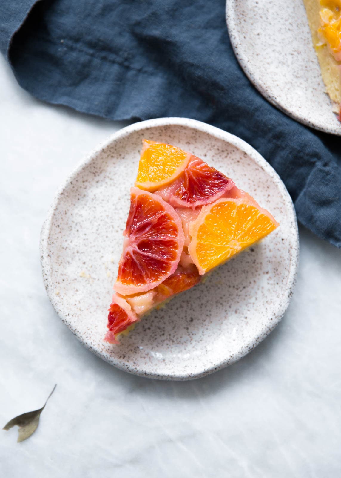 slice of citrus cake on a plate
