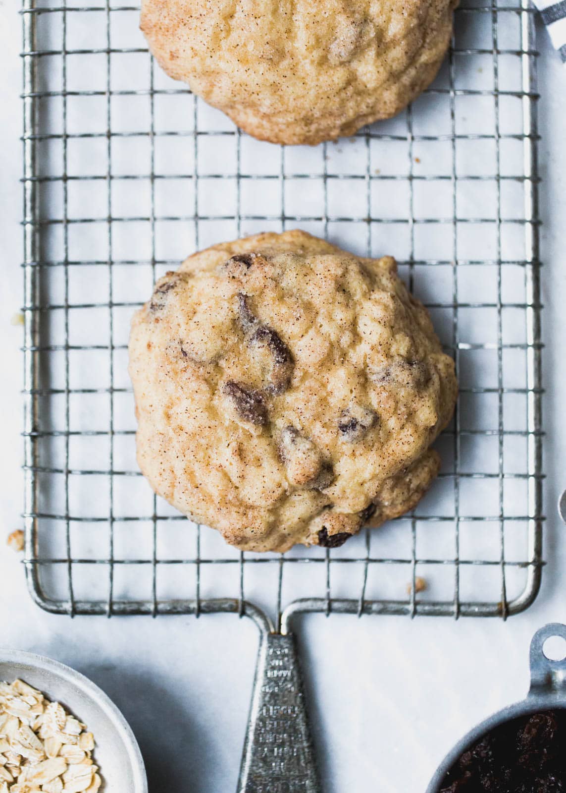 Oatmeal Raisin Snickerdoodle Cookies on a wire rack