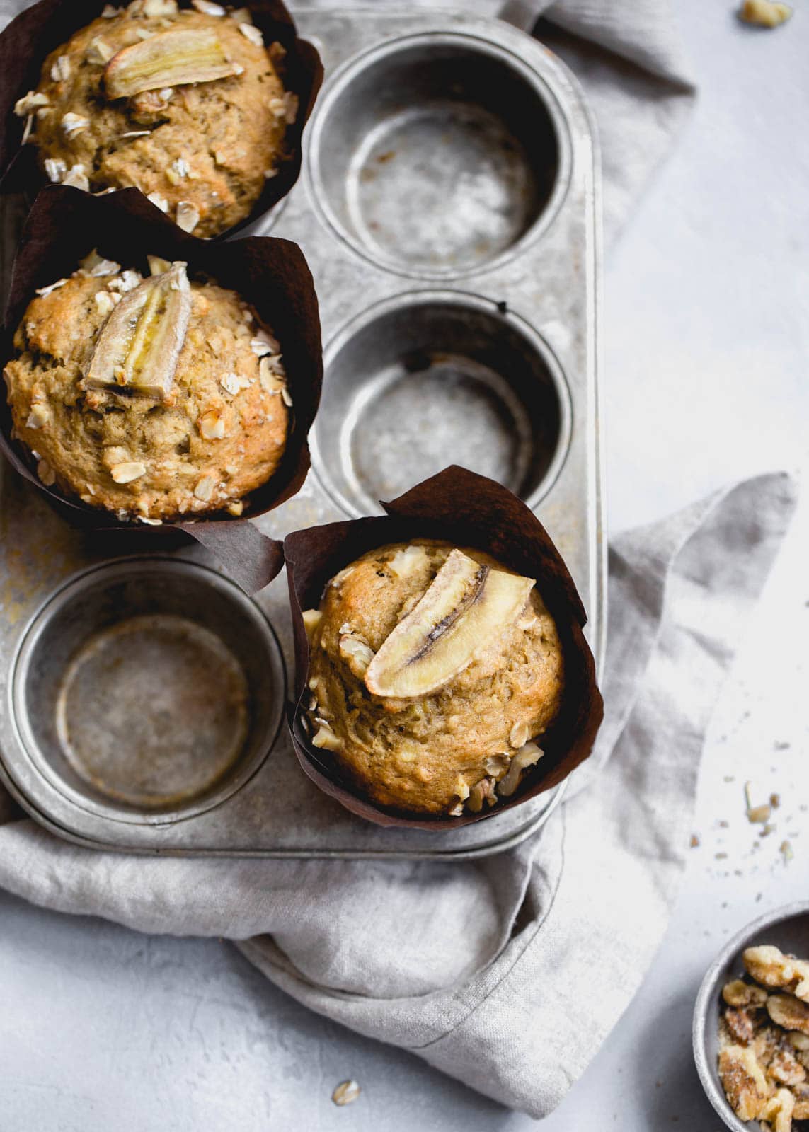 whole wheat banana muffins on towel