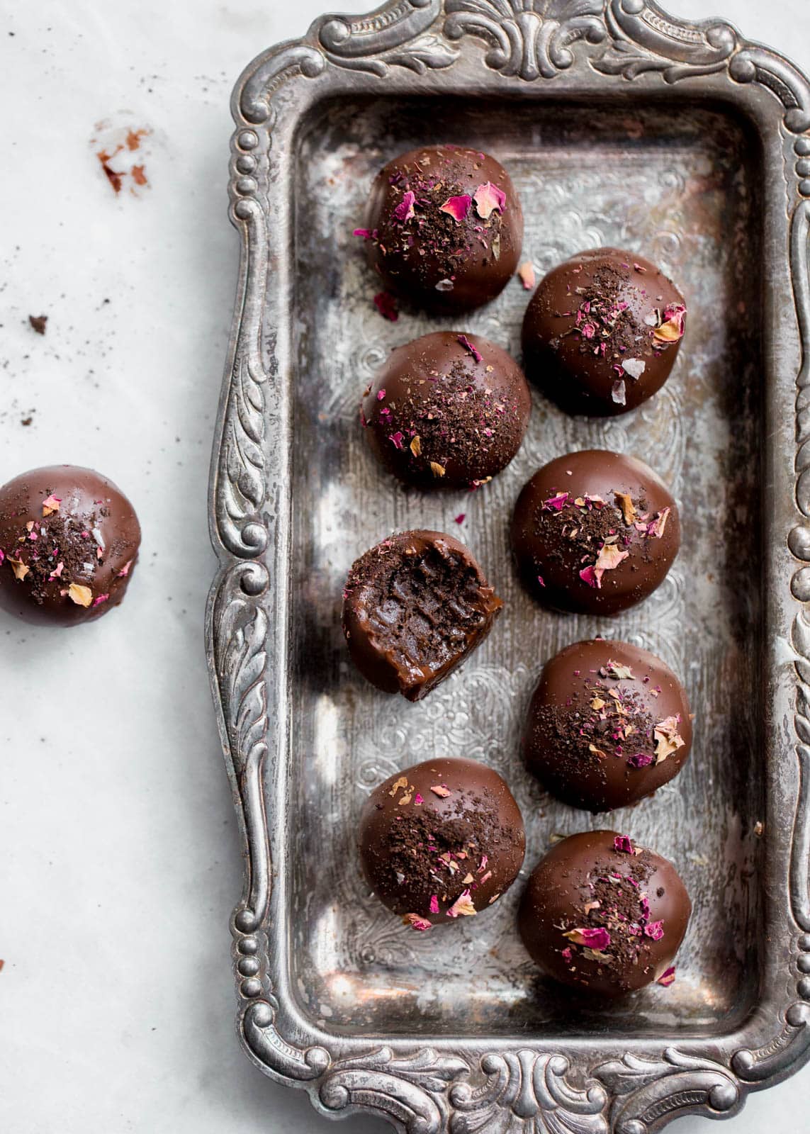 oreo truffles topped with rose hips and cookie crumbles