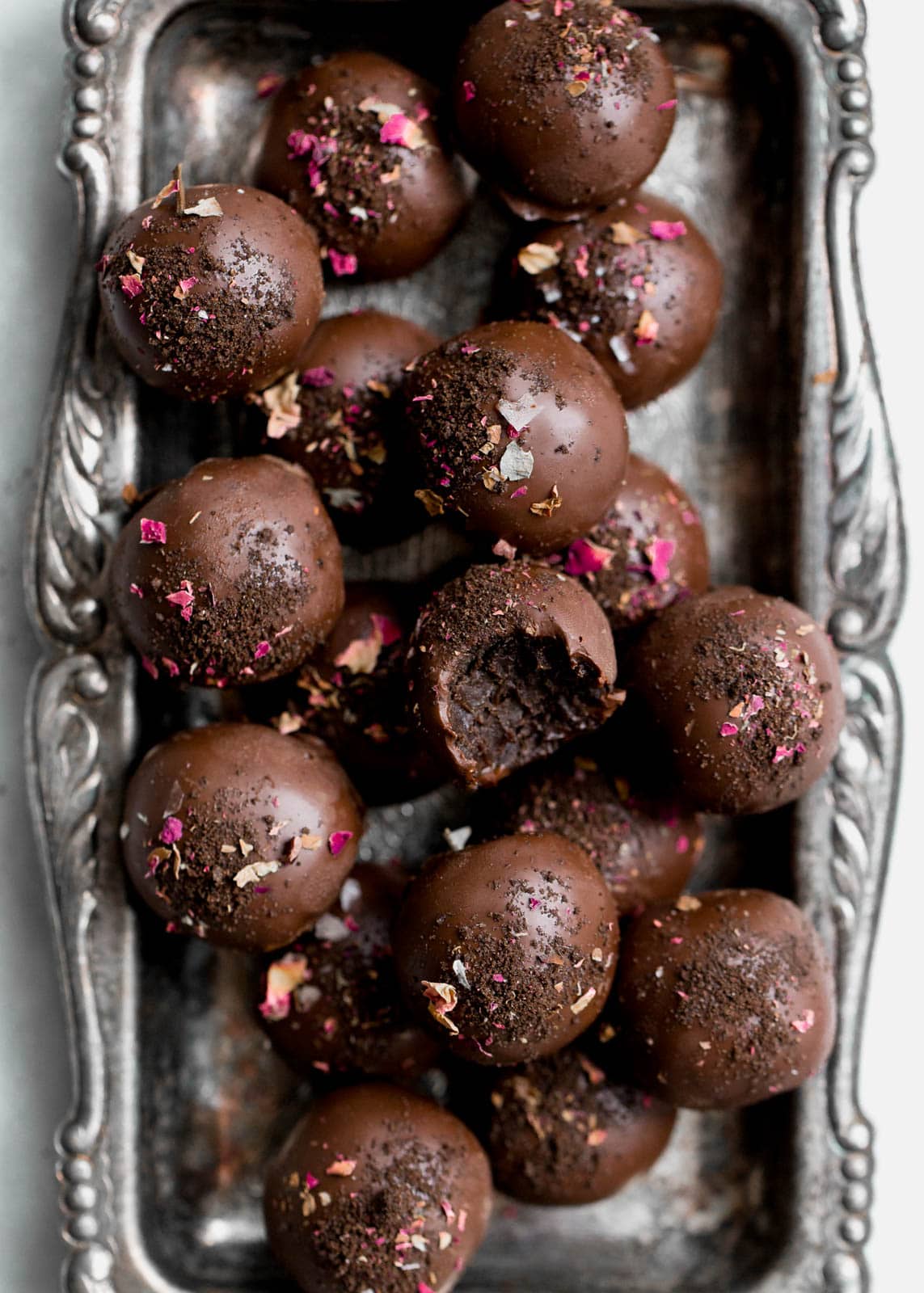 pile of oreo truffles on silver tray