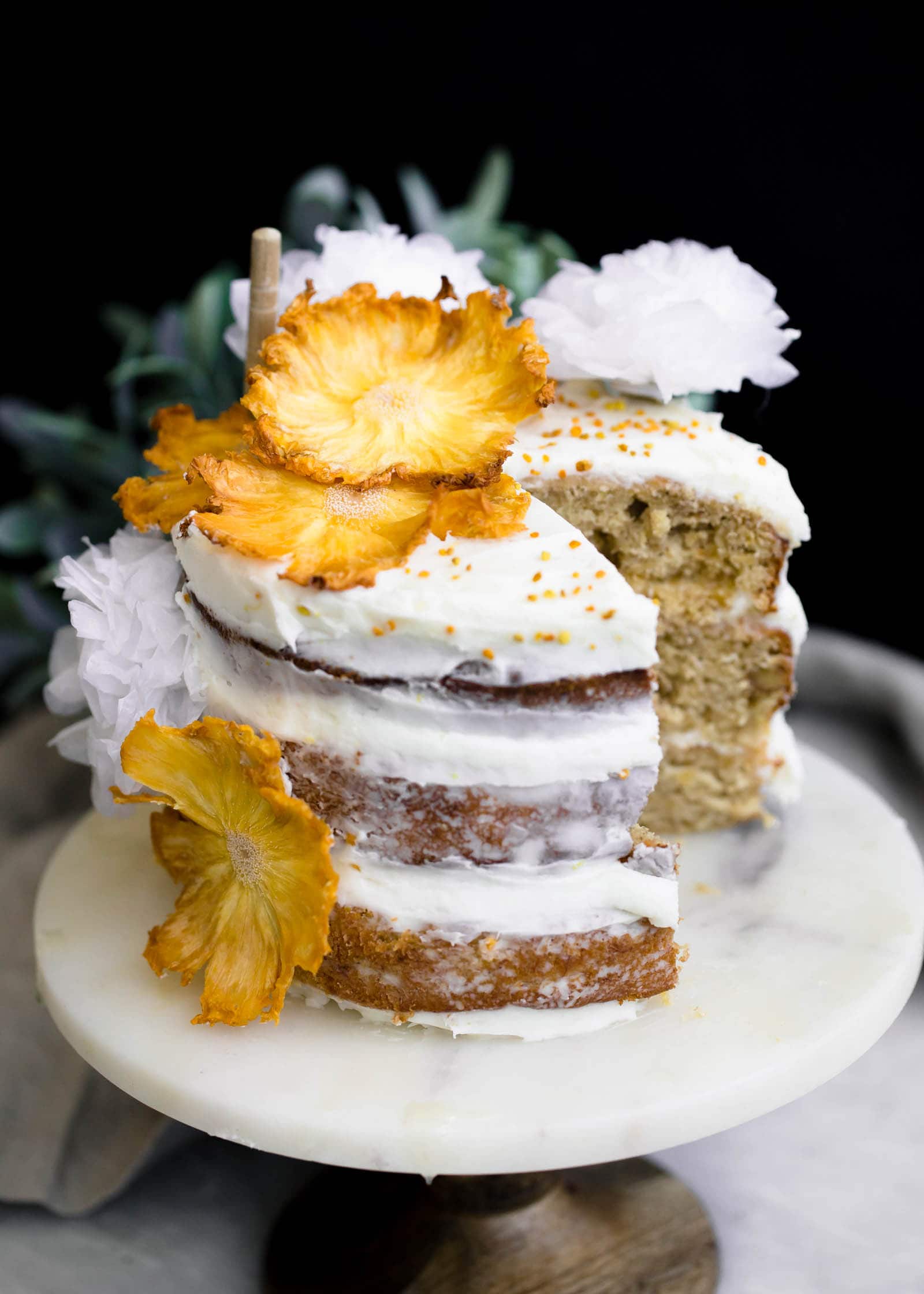sliced Hummingbird Cake on cake stand