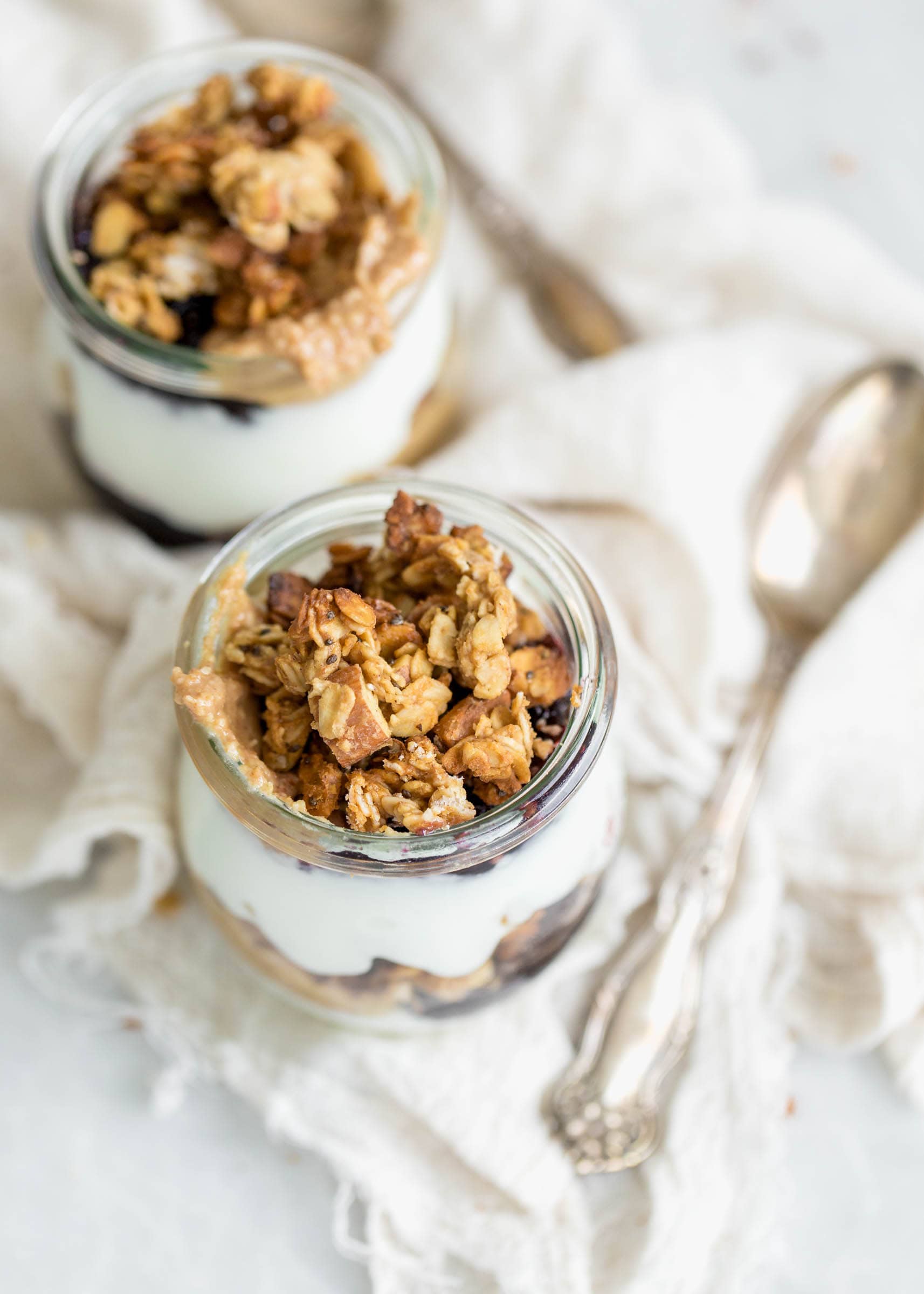 Peanut Butter and Jelly Yogurt Parfaits made with homemade peanut butter and honey granola and protein-packed Greek yogurt. YUM!