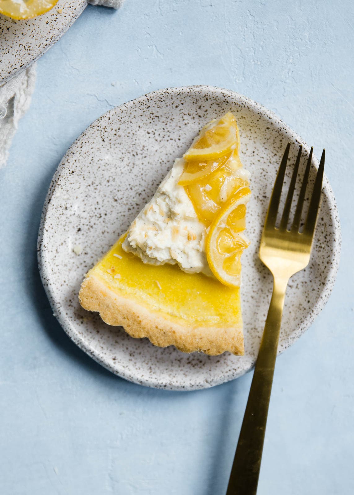 slice of Lemon Coconut Tart with Whipped Vanilla Bean Crème Fraîche