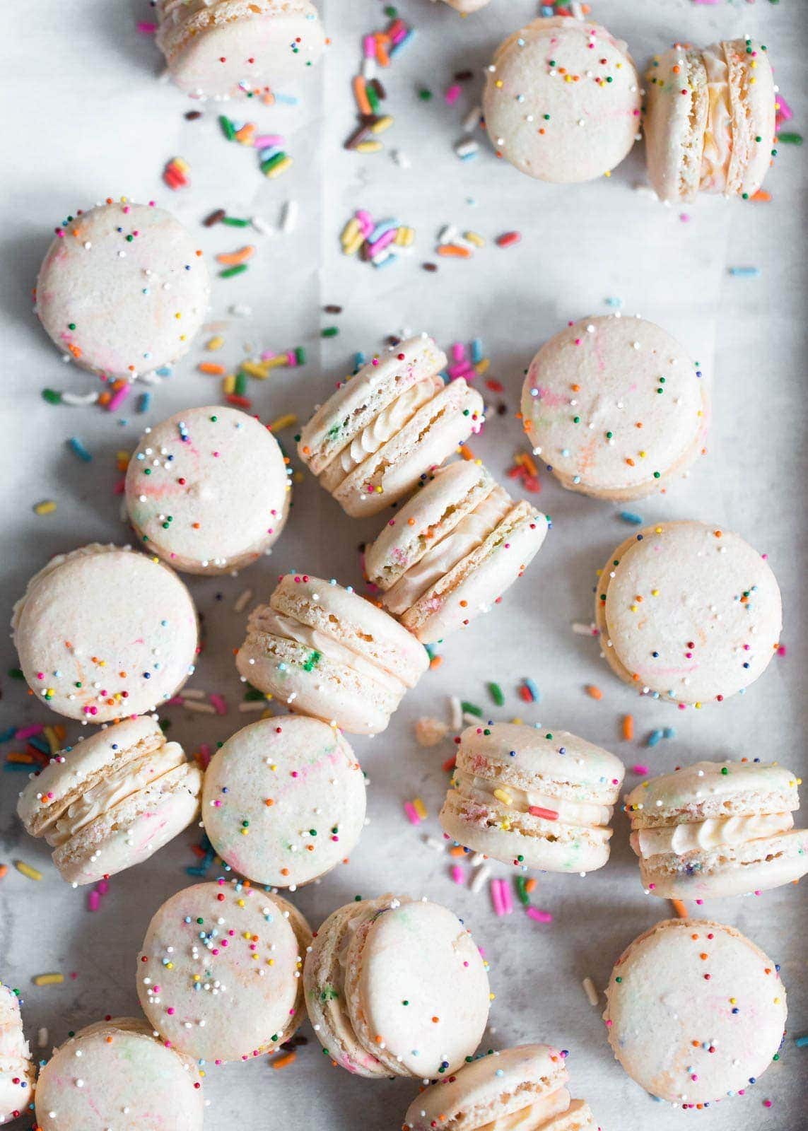 Homemade Cake Batter Macarons that taste like cake batter straight from the bowl. Plus, there's SPRINKLES!