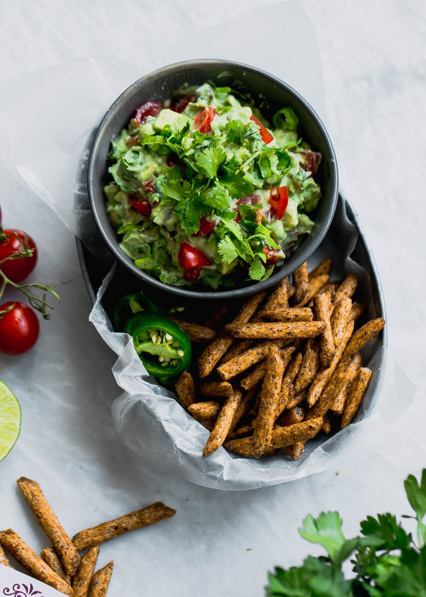 Secret ingredient alert! This Ultimate Skinny Guacamole is lighter and healthier, yet just as creamy and delicious. You'll never eat "regular" guac again!