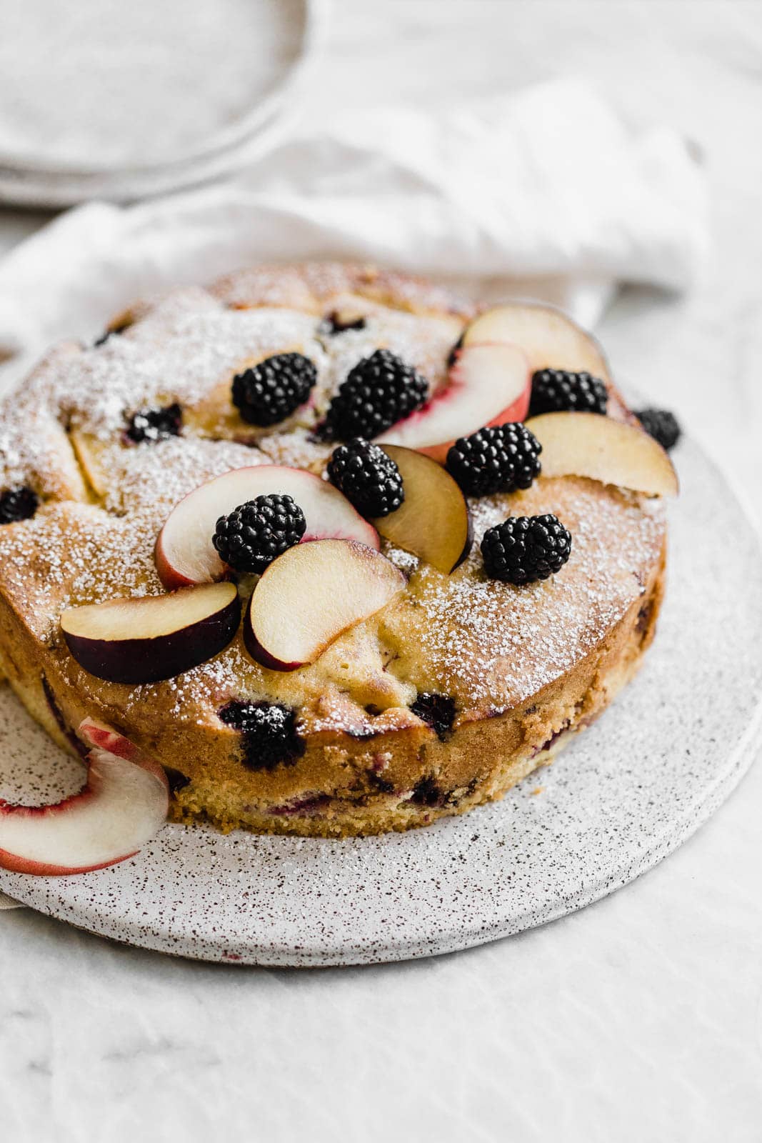 A delightfully summery one-bowl Semolina Olive Oil cake that is slightly sweet and surprisingly addicting! 
