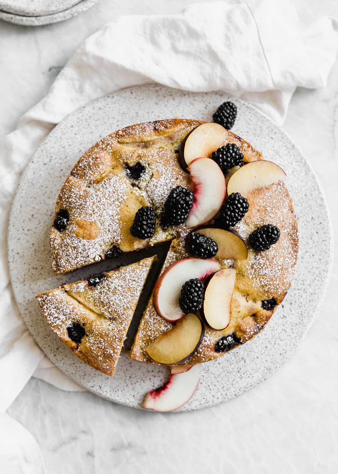 A delightfully summery one-bowl Semolina Olive Oil cake that is slightly sweet and surprisingly addicting! 