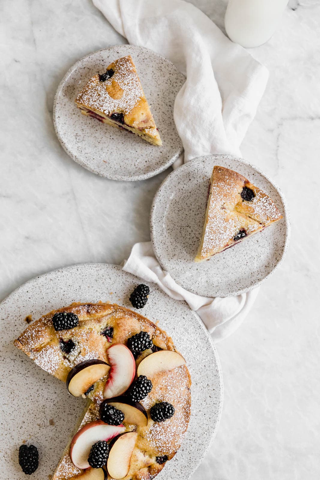 A delightfully summery one-bowl Semolina Olive Oil cake that is slightly sweet and surprisingly addicting! 