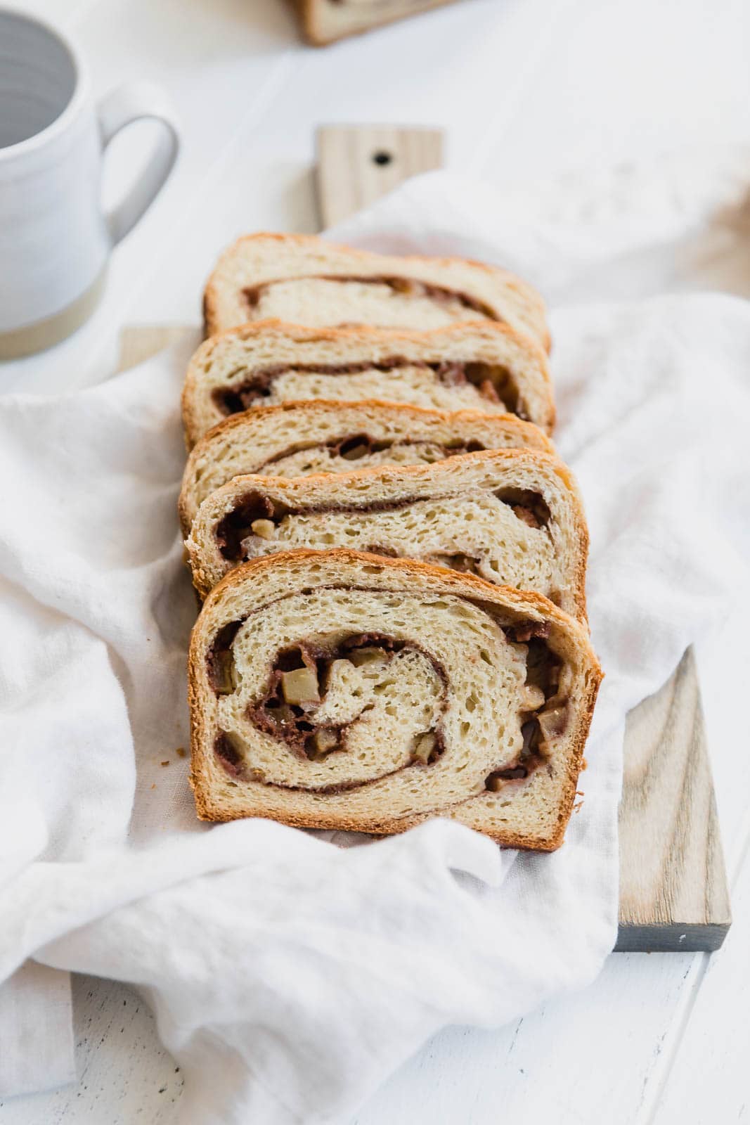 cinnamon swirl bread slices on cutting board 